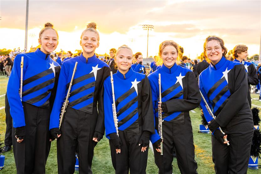 Students perform on football field